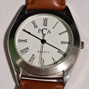 Pca quartz watch white face and brown strap
